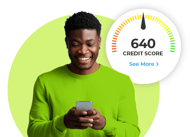 Excited man starting down at phone with 640 credit score